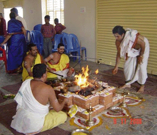 people celebrating a puja